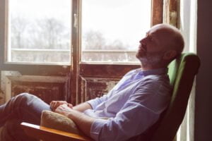 Man sitting and thinking- Problems Men Face When Growing Older - why you should worry about muscle loss after 50