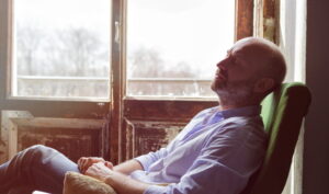 Man sitting and thinking- Problems Men Face When Growing Older