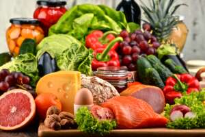 Healthy food including vegetables fruit bread dairy and meat -best men's vitamins