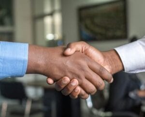 two men shaking hands