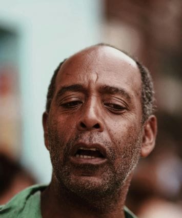 middle-age man breathing from mouth