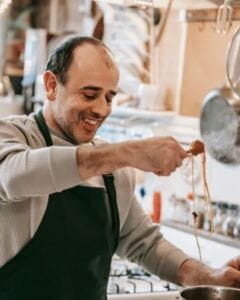 Man happy while cooking - use visualization to achieve mind over body