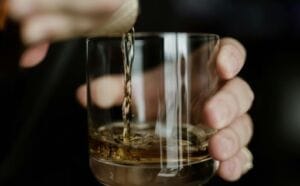 a glass with alcohol in it - Cut Down on Alcohol